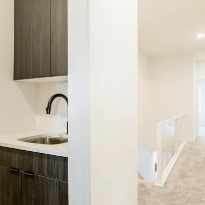 Modern Infill Staged Laundry Sink